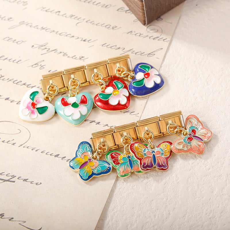 The Vibrant Enamel Butterfly & Floral Heart Dangle Charm in Gold