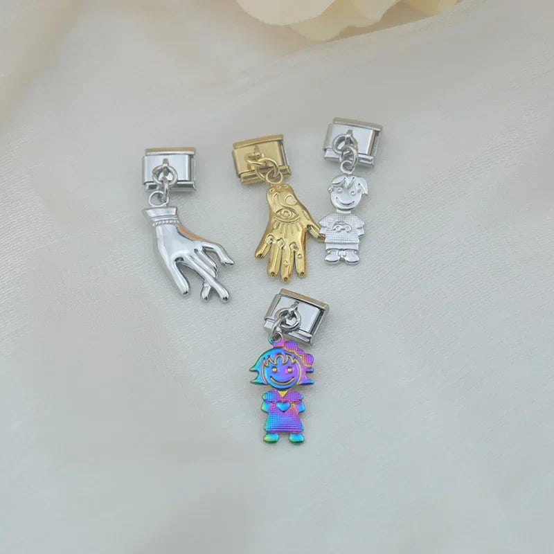 he Sculpted Figure & Hand Dangle Charm in Silver, Gold & Iridescent