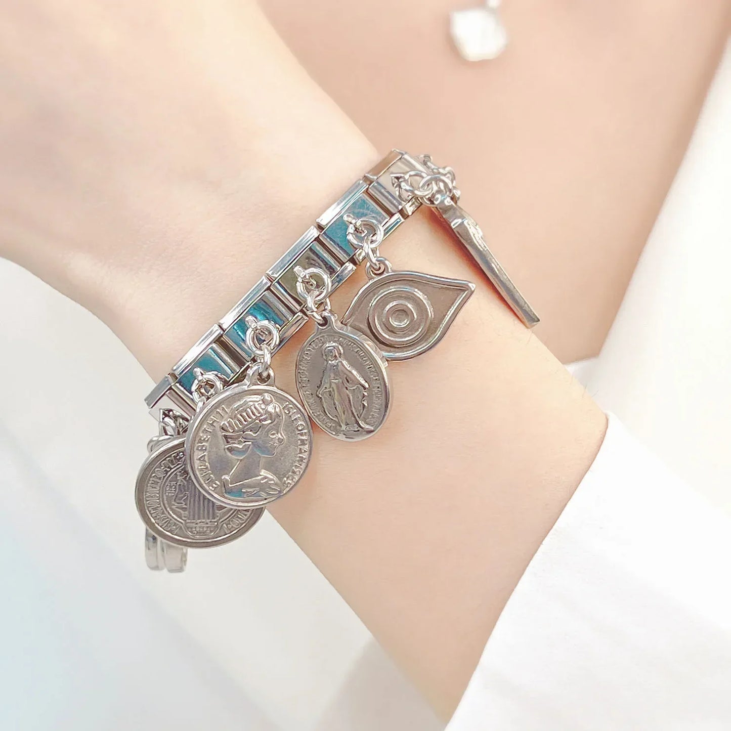 The Vintage Heritage & Sacred Medallion Dangle Charm in Silver
