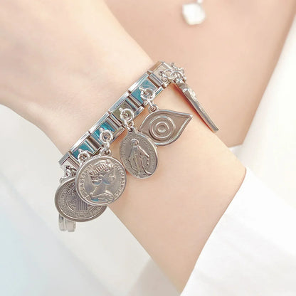 The Vintage Heritage & Sacred Medallion Dangle Charm in Silver