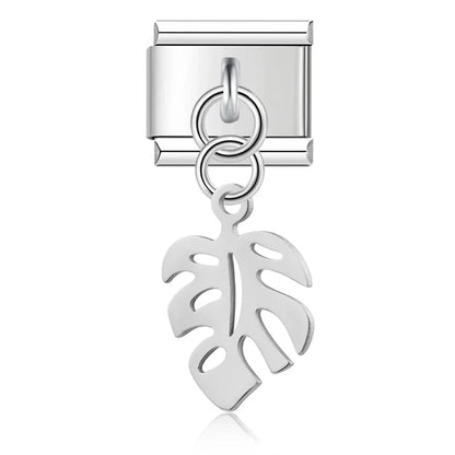 The Flower, Cross, Leaf & Bell Dangle Charm in Silver