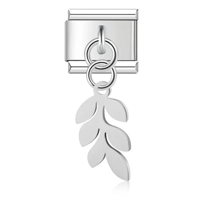 The Flower, Cross, Leaf & Bell Dangle Charm in Silver