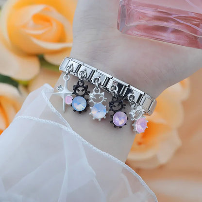 The Pastel Starburst & Crystal Cat Dangle Charm in Silver