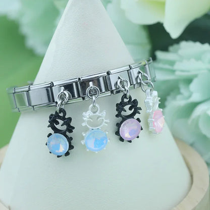 The Pastel Starburst & Crystal Cat Dangle Charm in Silver