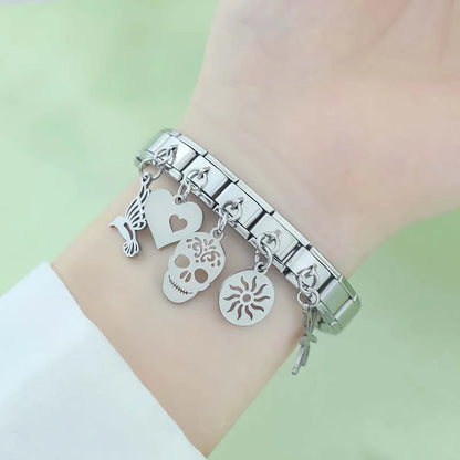 The Silver Silhouette & Luck Motif Dangle Charm