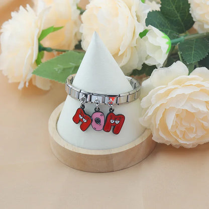 The Playful Monster Alphabet Dangle Charm in Silver