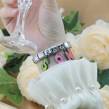 The Playful Monster Alphabet Dangle Charm in Silver