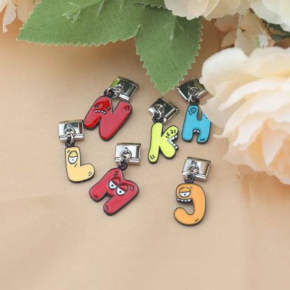 The Playful Monster Alphabet Dangle Charm in Silver