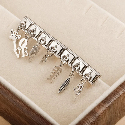The Classic Silver Silhouette & Symbol Dangle Charm