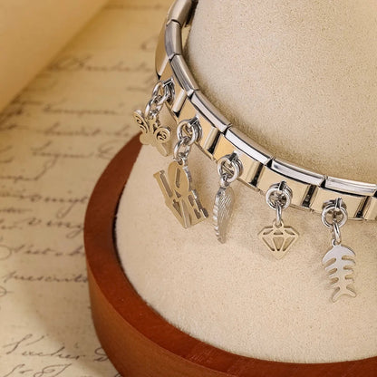 The Classic Silver Silhouette & Symbol Dangle Charm