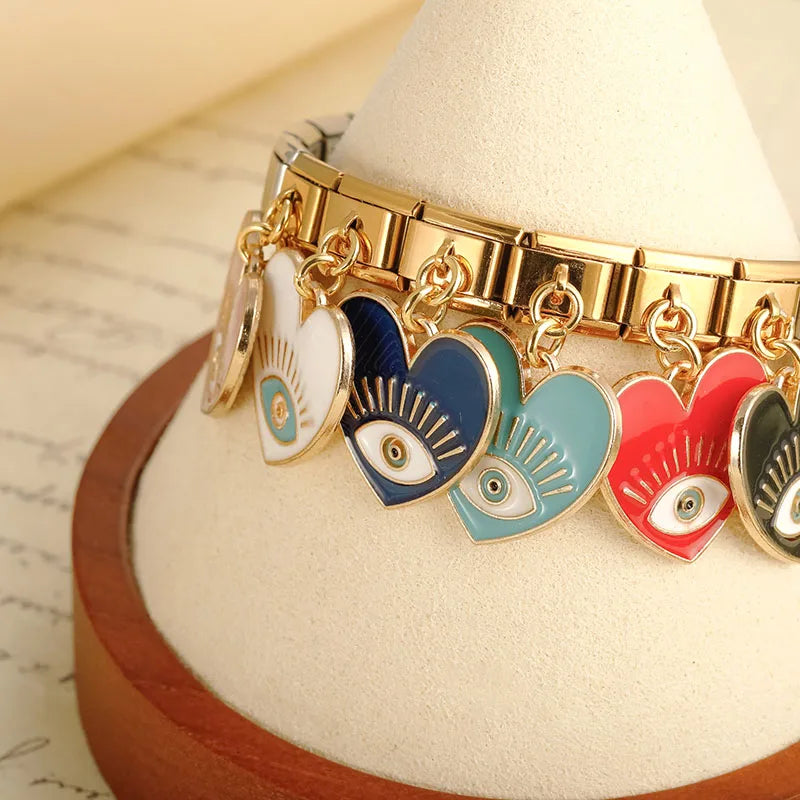 golden colorful heart eye charms
