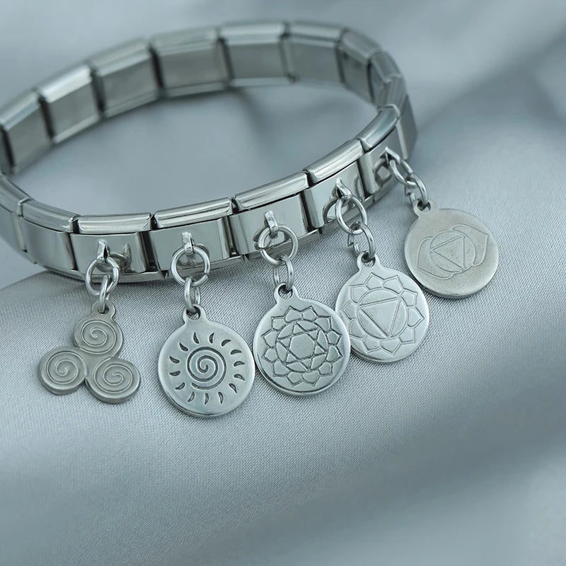 round silver designs charms