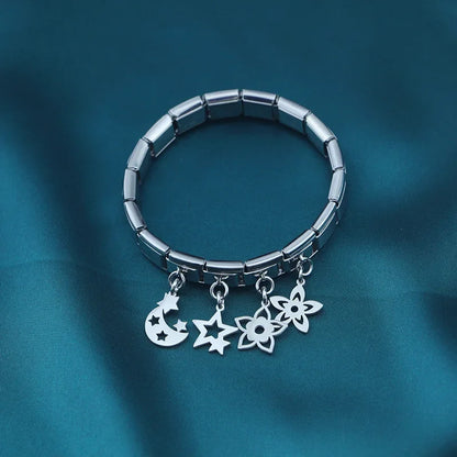 The Star, Moon & Flower Dangle Charm in Silver & Gold