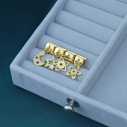 The Star, Moon & Flower Dangle Charm in Silver & Gold