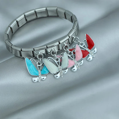 The Marquise Crystal & Enamel Butterfly Dangle Charm in Silver