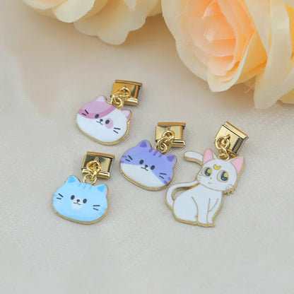 The Whimsical Gold Enamel Cat Dangle Charm in Gold