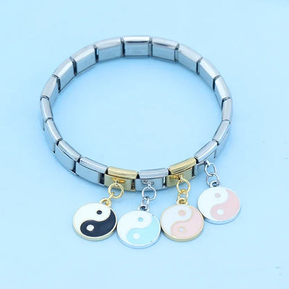 The Harmony Yin Yang Enamel Dangle Charm in Silver & Gold
