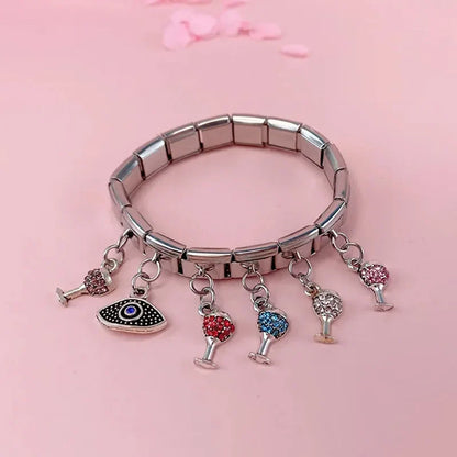 The Celebration Glass & Textured Eye Dangle Charm