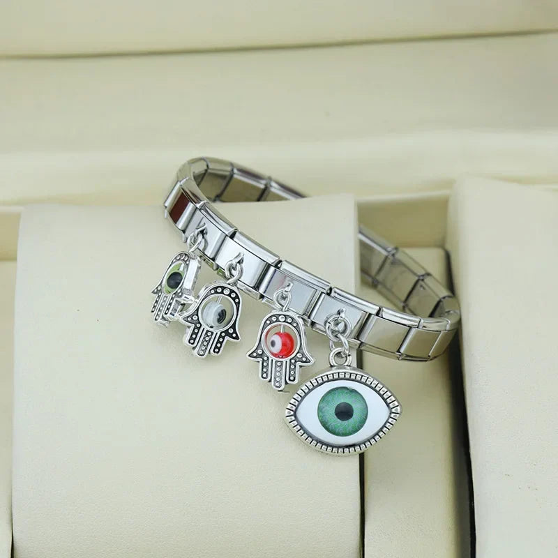 Eyes Palms silver and gold pendant charms