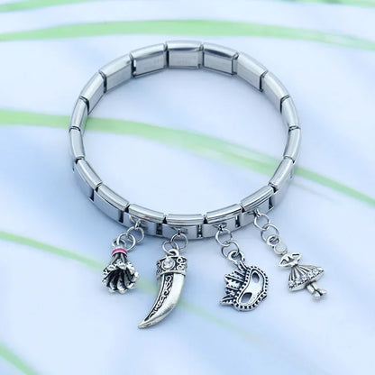 The Girl, Mask, Eye & Passport Dangle Charm