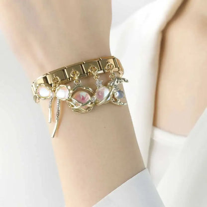 The Celestial Orb & Luminous Butterfly Dangle Charm in Silver & Gold