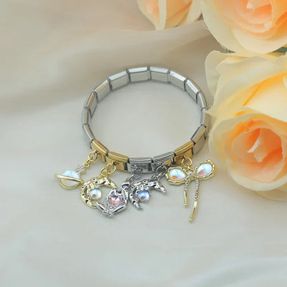The Celestial Orb & Luminous Butterfly Dangle Charm in Silver & Gold
