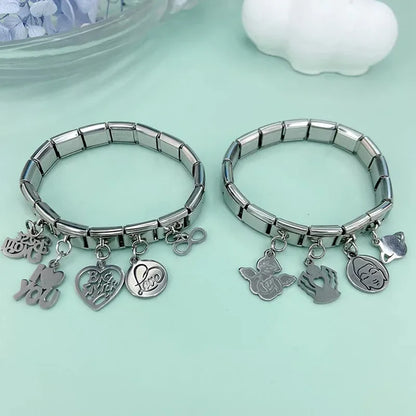The Silver Symbols & Icons Dangle Charm Collection