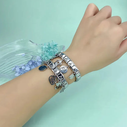 The Silver Symbols & Icons Dangle Charm Collection