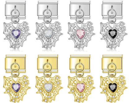 Set of silver and gold charms with heart-shaped gemstones on a white background