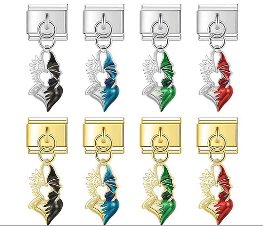 A 9mm Italian charm featuring a split heart dangle with one metallic angel wing and one colored enamel devil wing. Available in black, blue, green, and red on silver and gold bases.