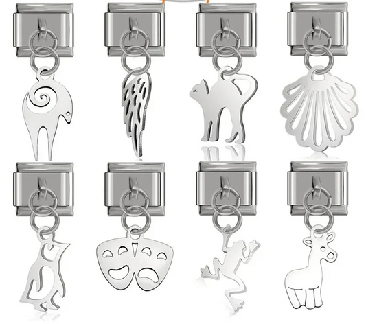 A collection of 8 silver dangle Italian charms on 9mm modular links featuring silhouettes of a cat, penguin, frog, ram, giraffe, seashell, angel wing, and theater masks - Charmtastic