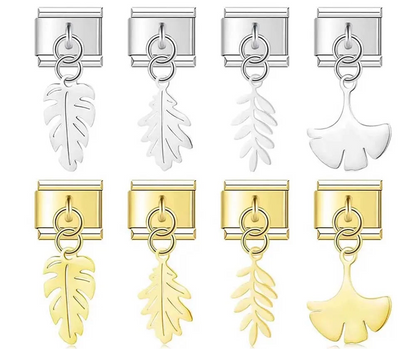 A set of 8 botanical leaf dangle Italian charms on silver and gold 9mm modular links featuring monstera, oak, fern, and gingko silhouettes - Charmtastic