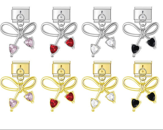 Set of bow-shaped earrings with heart and gemstone charms (chrmtastic )