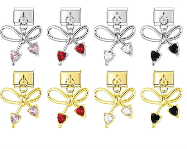 Set of bow-shaped earrings with heart and gemstone charms (chrmtastic )