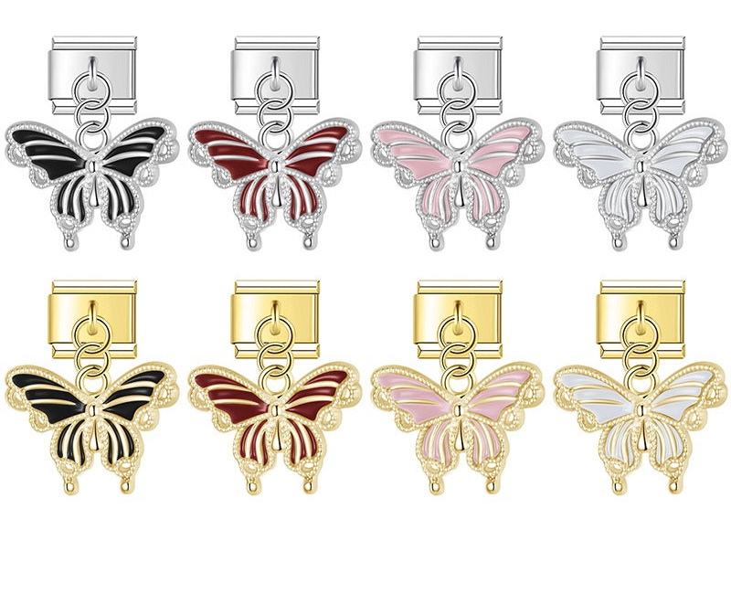 Italian charm bracelet link featuring a scalloped butterfly silhouette dangle in black, red, pink, and white enamel with silver and gold finishes.