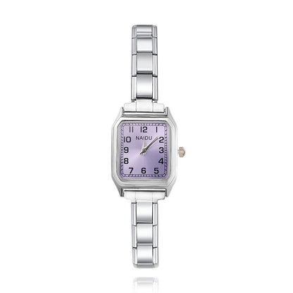 Silver watch with a purple face on a white background