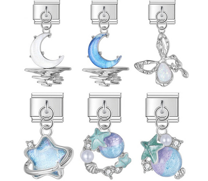 9mm silver Italian charm bracelet links featuring moon over water reflections, an abstract opal wing, a shooting star, and iridescent sea spheres with starfish and pearls.
