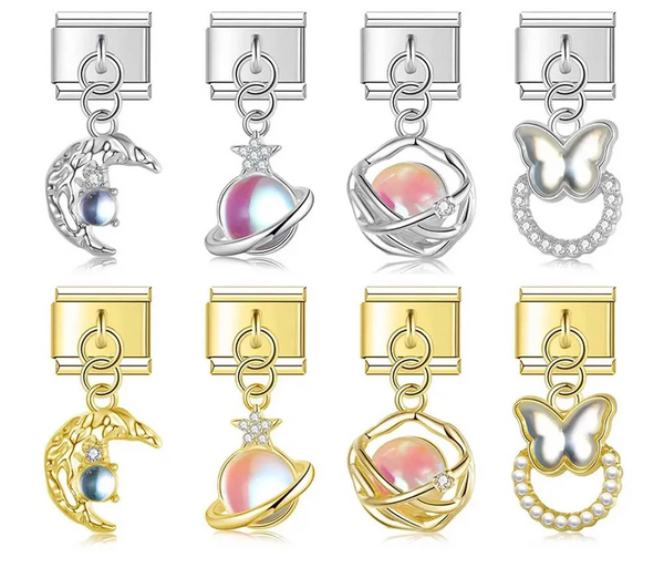 9mm Italian charm bracelet links in silver and gold featuring crescent moons, planets, and wire nests holding iridescent orbs, plus butterflies on crystal and pearl wreaths.