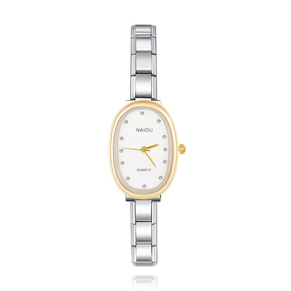 Silver and gold watch with white face on a white background