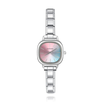 Silver watch with a multicolored face on charmtastic customaizable watch