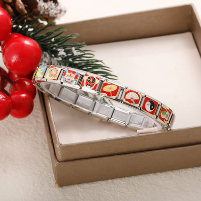Chinese Heritage & Cultural Symbols Charms Tai Chi Kite – Italian charm bracelet displayed against an open gift box with pine branch and red berries, showing assorted Chinese cultural symbol charm links, Italian charm bracelet by Charmtastic