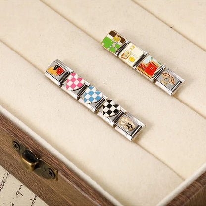Colorful Heart, Cheers & Football Charm – charm bracelet segments displayed in a jewelry box showing checkered heart, mask, curtain and soccer charms, Italian charm bracelet by Charmtastic