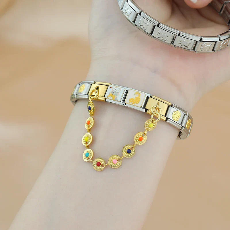 Colourful heart and evil eye gold safety chain links close-up — Italian charm, by Charmtastic