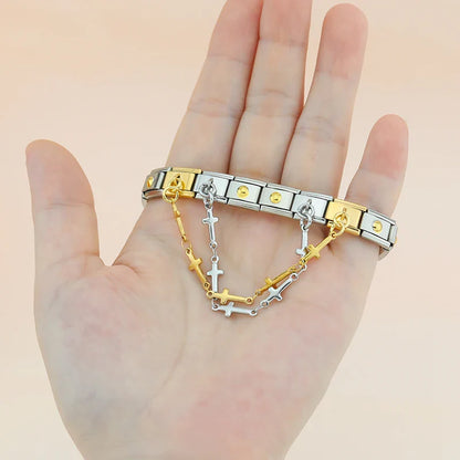 Cross Triangle Round Chain silver&gold – cross safety chain links in gold and silver worn on a stainless steel Italian charm bracelet, lifestyle photo by Charmtastic
