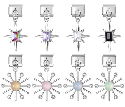 9mm silver Italian charm bracelet links featuring north star dangles with rectangular crystals and sunburst dangles with pastel cabochon centers.