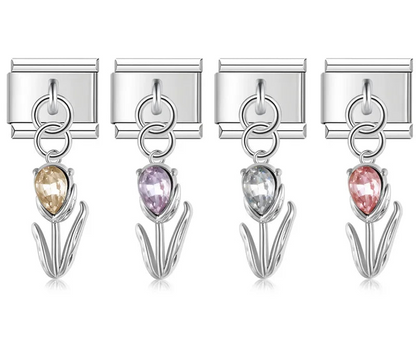 A set of 4 silver dangling Italian charms on 9mm modular links featuring tulip flowers with champagne, purple, clear, and pink crystal buds - Charmtastic