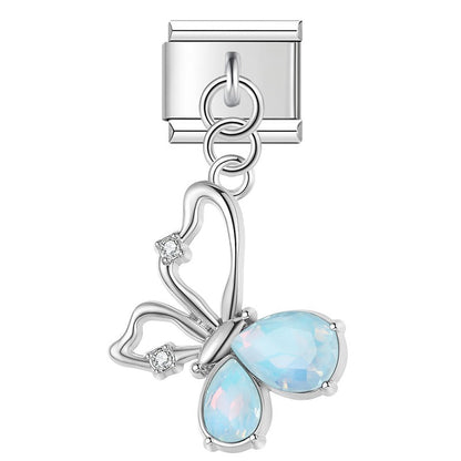The Crystal Teardrop Butterfly Dangle Charm in Silver & Gold