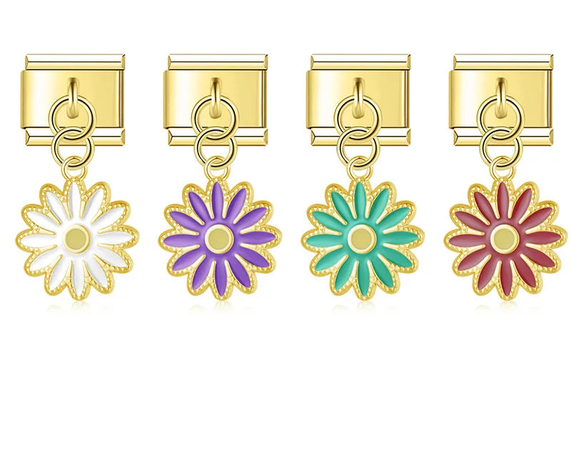 A 9mm gold Italian charm featuring a dangling daisy flower with scalloped gold edges. Available in white, purple, teal, and deep red enamel.