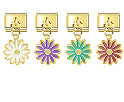 A 9mm gold Italian charm featuring a dangling daisy flower with scalloped gold edges. Available in white, purple, teal, and deep red enamel.