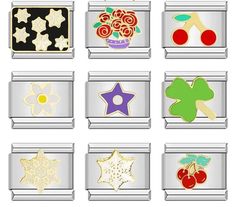 Glaze Charms: Flower, Star, Snowflake & Cherry – overview of enamel charms: gold snowflakes on black, red roses in a vase, cherries, daisy flower, purple star, four-leaf clover, and snowflake charms, Italian charm bracelet charms by Charmtastic